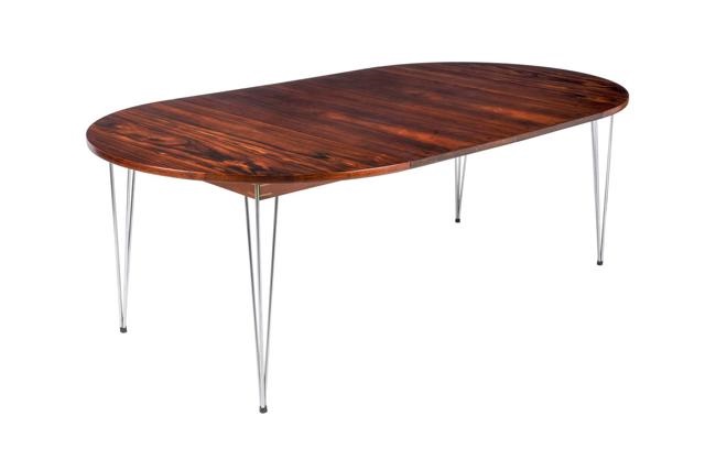 A ROSEWOOD AND CHROME PLATED DINING TABLE By Hans Brattrud On Artnet